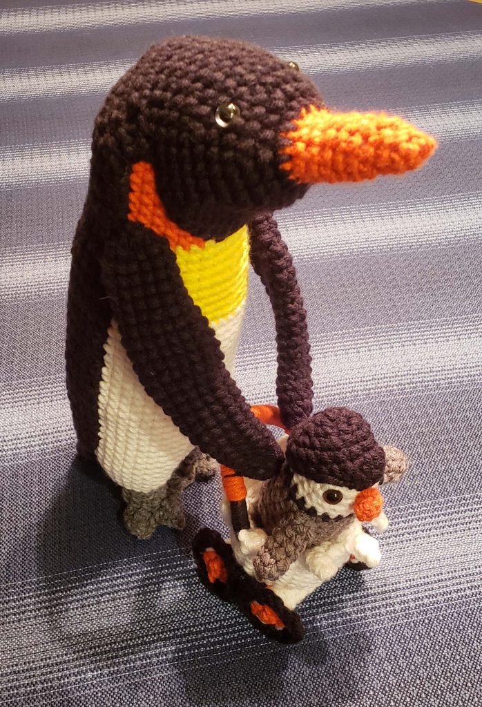 papa penguin and baby